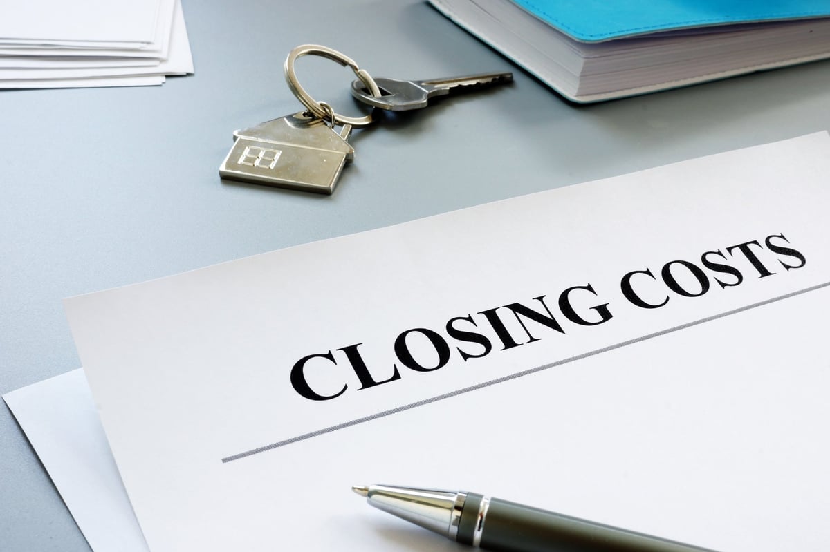 Documents for closing costs and keys.