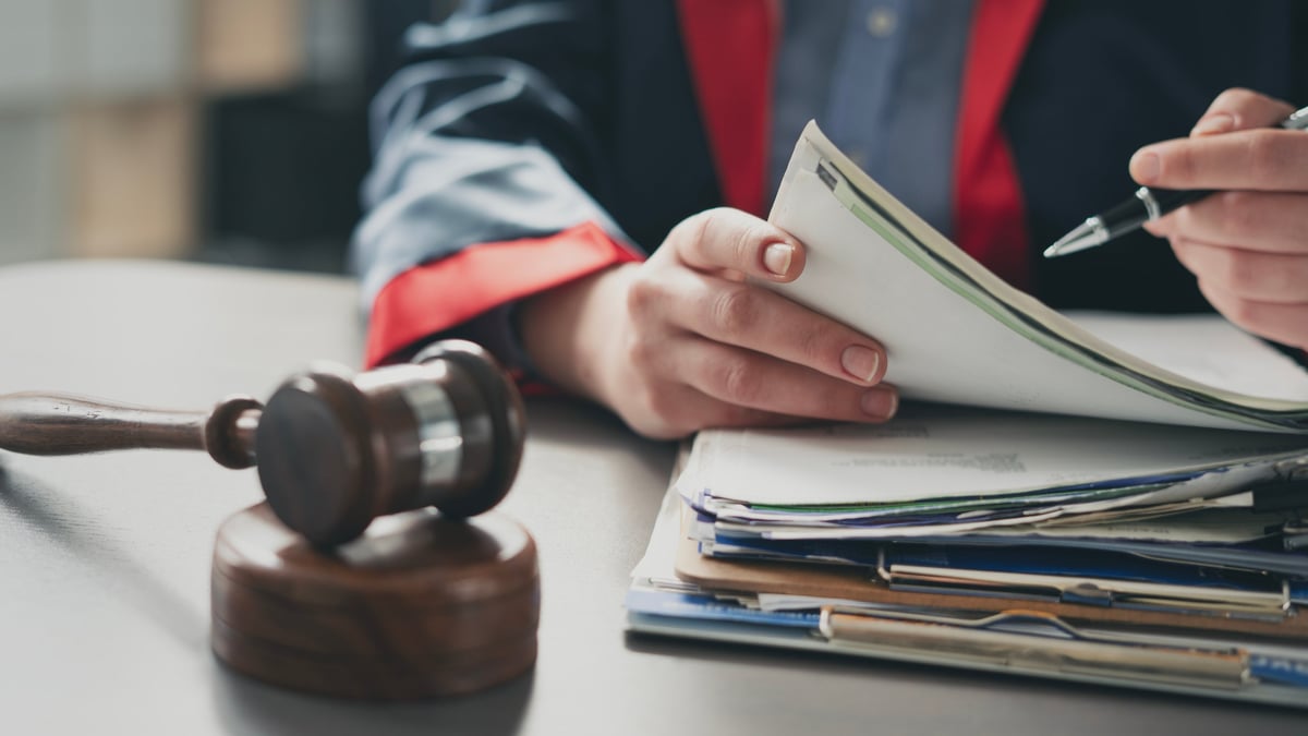 Judge working on a legal document